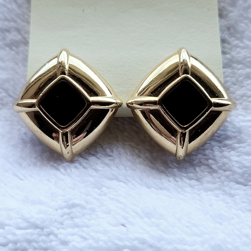 Vintage Monet clip earings.  Black enamel in the middle. 90's style